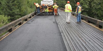 canada-mainroad-bridge-surfacing-over-wood-2005-04-015