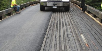 canada-mainroad-bridge-surfacing-over-wood-2005-04-038